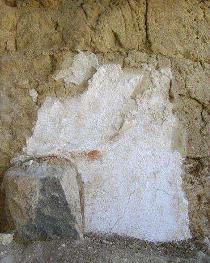 Particolare dell'intonaco con macchia di colore Particolare dell'intonaco con macchia di colore