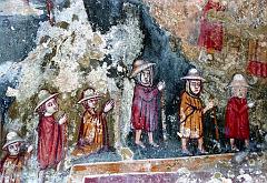 Affresco medievale con pellegrini all'interno del mitreo 